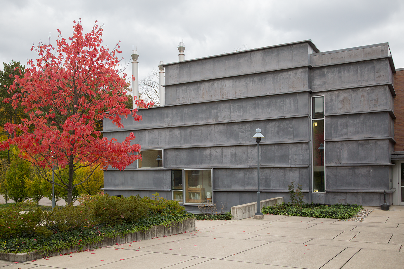 Photo of Cranbrook Campus building exterior, gray horizontal lines