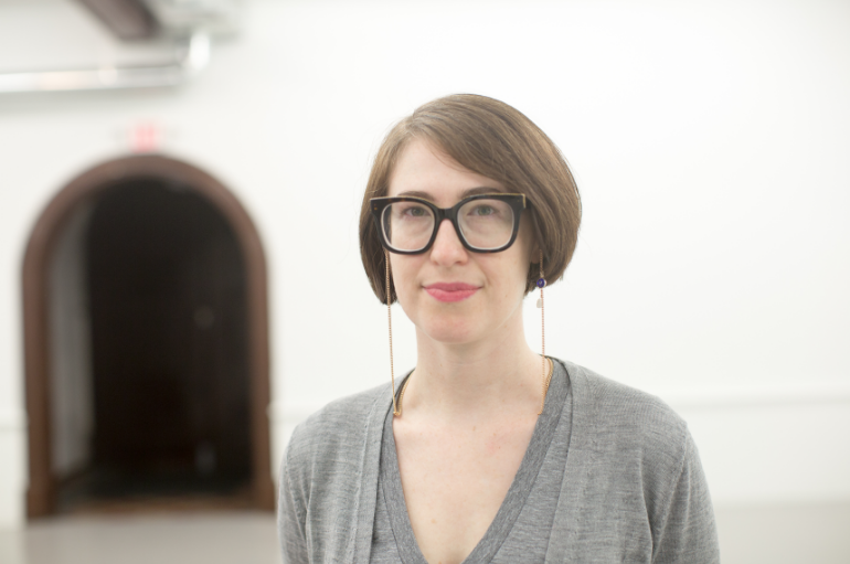 headshot of Casey Droege in gray sweater