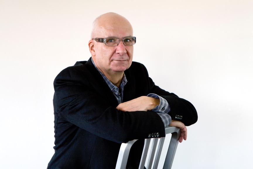 Garth Clark headshot with silver chair