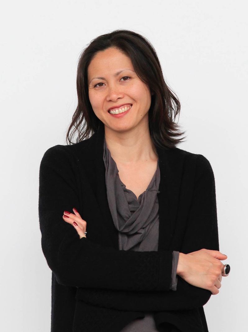 Tsz Yan Ng headshot with gray blouse and black blazer