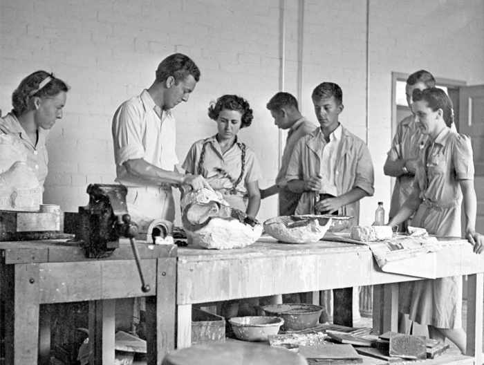 Instructor Marshall Fredericks (Assistant to Carl Milles and Instructor at Cranbrook Kingswood Schools, 1932 –1934, Instructor, Department of Sculpture, 1934 –1942, second from left) with modeling and casting summer class at Cranbrook Academy of Art, July 1940. Courtesy of Cranbrook Archives, Center for Collections and Research. Photo: Richard G. Askew